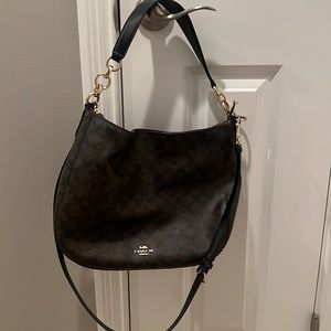 Coach shoulder and crossbody brown with black straps. Hardly carried.